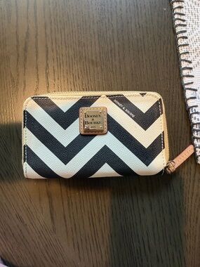 Dooney & Bourke Black and White Chevron Zip Around Wallet with Gold Plaque